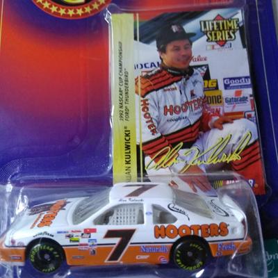 Sale Photo Thumbnail #180: 2001 Cottonelle Chase the Race Collectors Series 1:64 Scale #7612071A / 1999 Hooters Lifetime Series Winner Circle 1:64 Scale 1 of 3 #58638