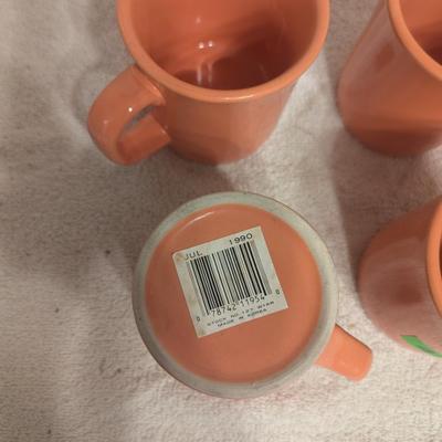 set of 4 coffee cups, peach colored