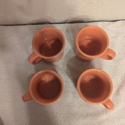 set of 4 coffee cups, peach colored