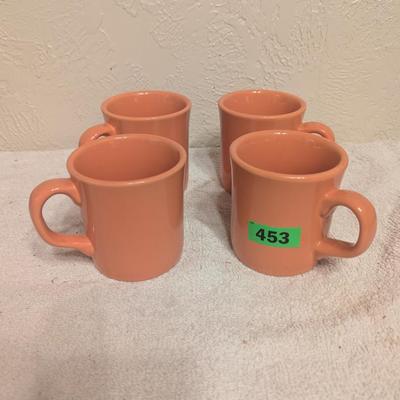 set of 4 coffee cups, peach colored