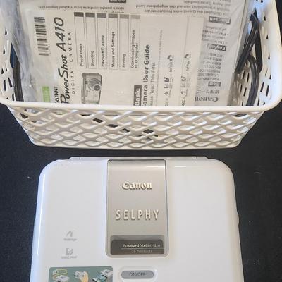 Sale Photo Thumbnail #256: Canon Selphy CP200 Photo Printer w/ instructions & working

Will receive all items pictured as is.