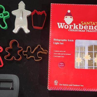 Sale Photo Thumbnail #424: Vintage Christmas Cookie Cutter Gingerbread & Boston Warehouse Spreaders. Also Santa's Work bench Icicle Decorations

Will receive all items as pictured.