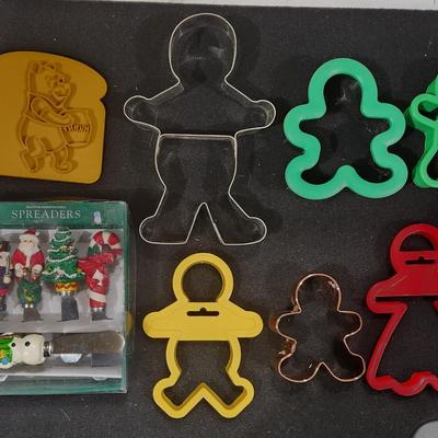 Sale Photo Thumbnail #423: Vintage Christmas Cookie Cutter Gingerbread & Boston Warehouse Spreaders. Also Santa's Work bench Icicle Decorations

Will receive all items as pictured.