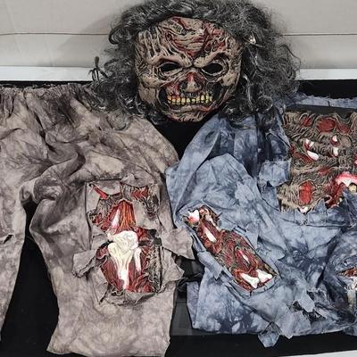 Sale Photo Thumbnail #393: Huge Vintage Halloween Costume Decorations & much more lot. Just in time for Halloween. Includes Vampire Teeth , Spooky makeup , Trick-or-treat bags Deadman Costume and much more.

Will receive all items pictured as is.