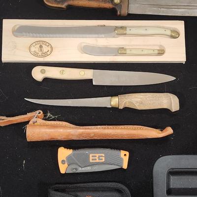 Sale Photo Thumbnail #30: Retro Knife Pocket Knife Dagger Kitchen lot Gerber Bear Grylls Folding Scout Knife & many more

Will receive all items pictured as is.