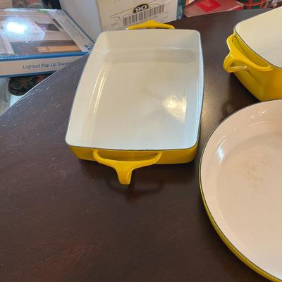 Sale Photo Thumbnail #309: Dansk Kobenstyle Cookware in Yellow Enamel  12 Piece Set   The Lids are designed to double as trivets.