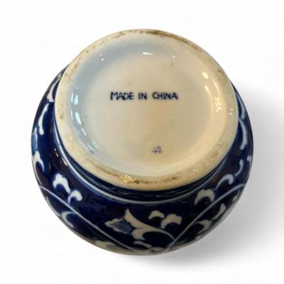Sale Photo Thumbnail #312: Chinese Blue and White Porcelain Vase with a Flora Design.    Approximately 7.5" Tall