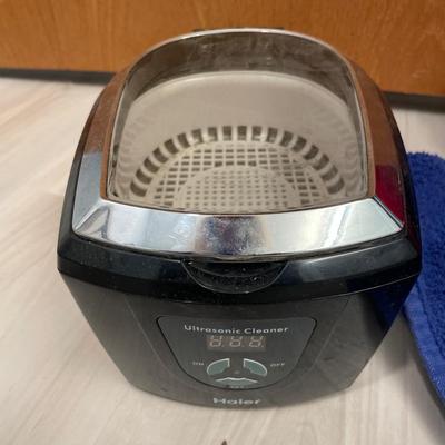 Foot cleaner, jewelry cleaner and beach towels