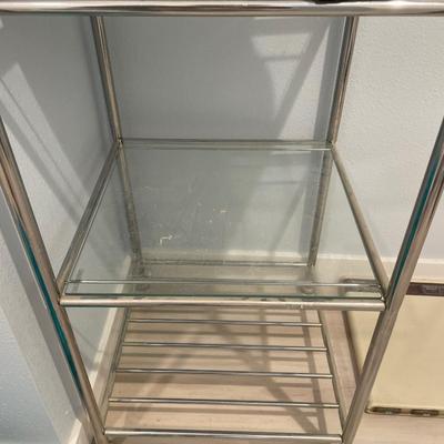 Radio on silver and glass storage with Sharp scale