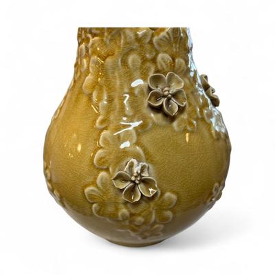 Sale Photo Thumbnail #333: Benjara Remi Yellow Ceramic Round Decorative Flower Vase  Has one broke flower on the vase.  Unbranded
Approximately 8.5" tall