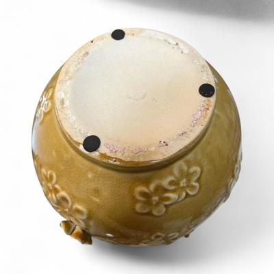 Sale Photo Thumbnail #332: Benjara Remi Yellow Ceramic Round Decorative Flower Vase  Has one broke flower on the vase.  Unbranded
Approximately 8.5" tall