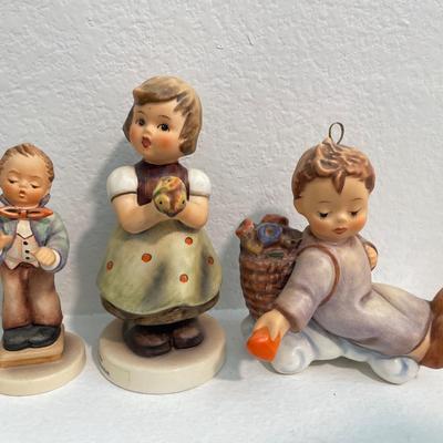 Norman Rockwell and Goebel figures