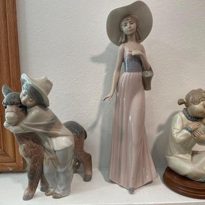 Lladro donkey, Nau tall lady and girl figures