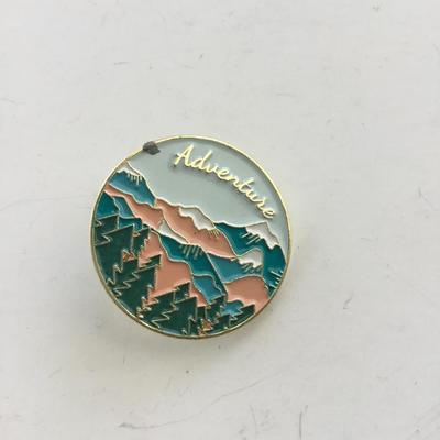Gold tone adventure push pin