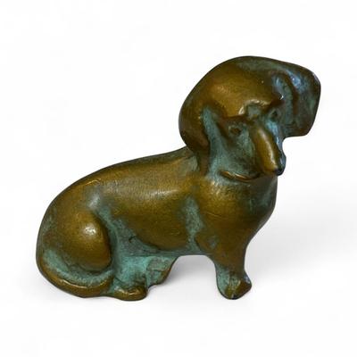 Sale Photo Thumbnail #371: Set Of 4 Dachshund Figurines   Three Ceramic and one Brass
Approximately  4" Long
