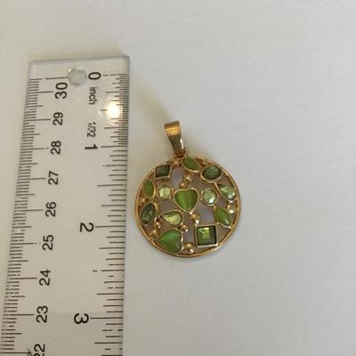 Vintage Roman signed gold tone pendant with green Rhinestones