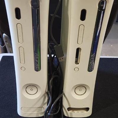 Sale Photo Thumbnail #15: Retro Xbox 360 lot w/ controller & wireless internet adapter

Consoles power on but didn't test with any games. Buying as is and operate under the impression they need to be repaired because there will be no refunds. Controller works.