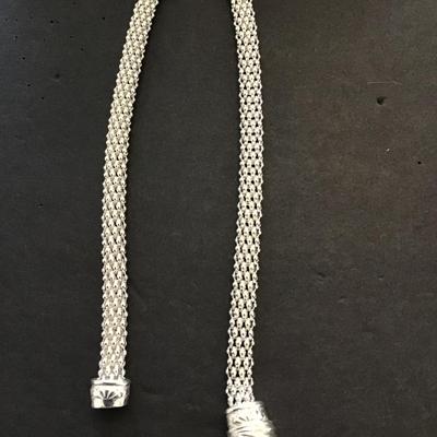 Sale Photo Thumbnail #64: Very nice Silvertone. Magnetic clasp choker necklace. Please see attached photos.
