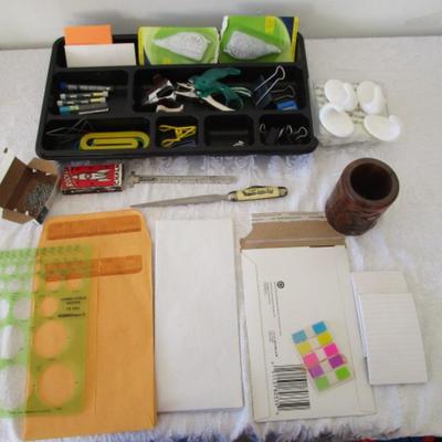Sale Photo Thumbnail #109: Desk drawer organizer,  paper clips (various sizes), post-it notes, post-it flags, small metal ruler, circle template, 2 staple removers, note pads, #10 envelopes, correction tape, letter opener with knife, hole punch, Command hooks, etc.