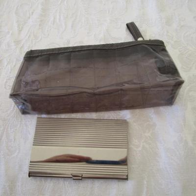 Sale Photo Thumbnail #139: Solar calculator, 2 pencil cases, 3x5 index card metal box, small metal shelf, drawing pencils, USB keypad, Expo markers & eraser, file tabs, business card holder, USB power bank, etc.