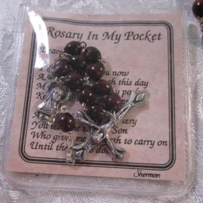 Sale Photo Thumbnail #204: 2 necklaces, 2 rosaries, 1 standing decorative plaque 6-1/2" wide x 9-3/8" tall, 1 magnet