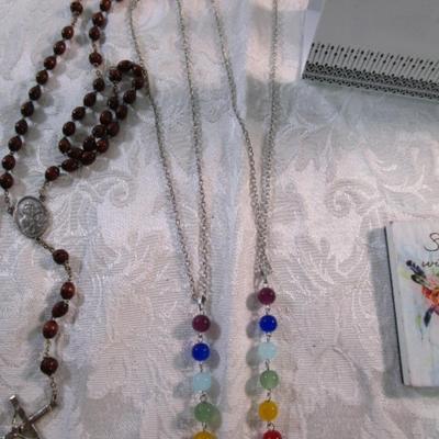 Sale Photo Thumbnail #206: 2 necklaces, 2 rosaries, 1 standing decorative plaque 6-1/2" wide x 9-3/8" tall, 1 magnet