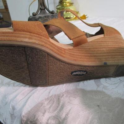 Sale Photo Thumbnail #309: Tan are Dr. Scholl's size 8M, silver are Fly London size 8, Black are Crocs size 8