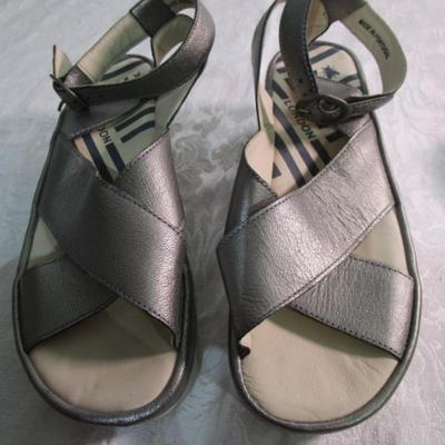 Sale Photo Thumbnail #310: Tan are Dr. Scholl's size 8M, silver are Fly London size 8, Black are Crocs size 8