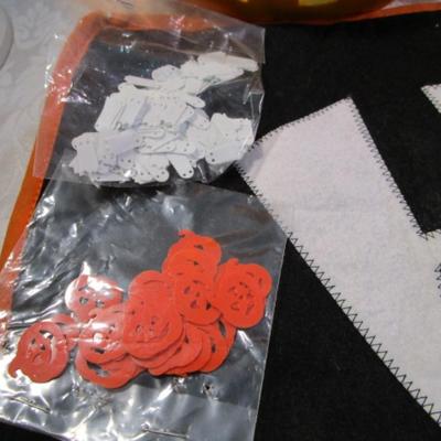 Sale Photo Thumbnail #431: Happy Halloween doormat,  new electric jack-o-lantern, Halloween basket & stuffed pumpkin, Doormat untested & takes 3 AG13 batteries not included, 2 bags Halloween confetti