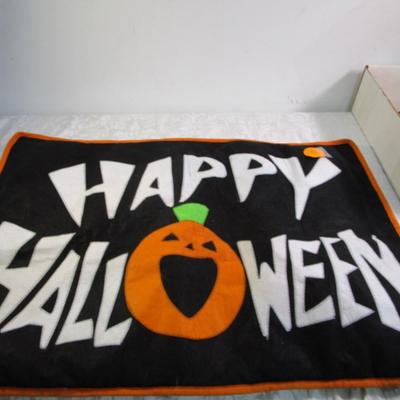 Sale Photo Thumbnail #435: Happy Halloween doormat,  new electric jack-o-lantern, Halloween basket & stuffed pumpkin, Doormat untested & takes 3 AG13 batteries not included, 2 bags Halloween confetti