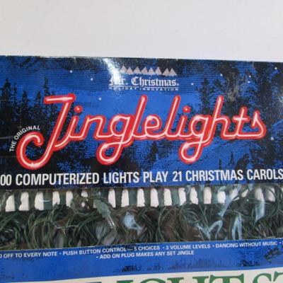 Sale Photo Thumbnail #535: 100 computerized lights play Christmas carols, lights are white, see pictures