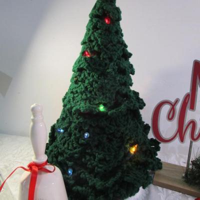 Sale Photo Thumbnail #541: Crocheted lighted Christmas tree, Merry Christmas plaque, bell, jingle bells, candle, glass tree, milk jug, clothespin nutcracker & ballerina, nativity