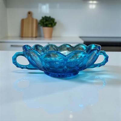 Sale Photo Thumbnail #476: Anchor Hocking Blue Candy Bowl with Handles
Approximately 7"X5.5X2"