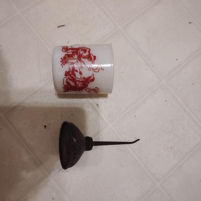 coffee mug and oil can