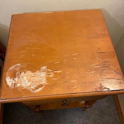 Small side table with damage to top