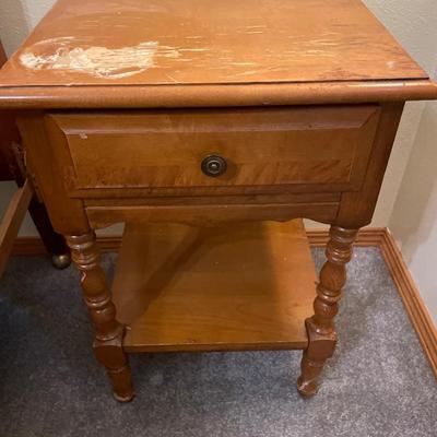 Small side table with damage to top