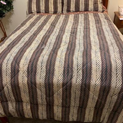 Full size Sealy Posturepedic mattress with bedding and frame