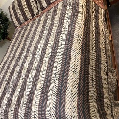 Full size Sealy Posturepedic mattress with bedding and frame
