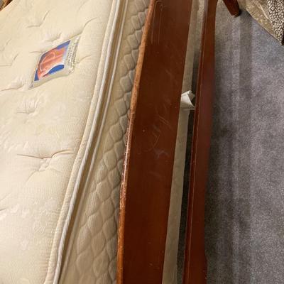 Full size Sealy Posturepedic mattress with bedding and frame