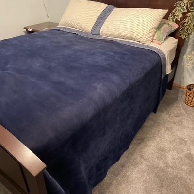 Queen mattress with frame and bedding