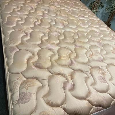Queen mattress with frame and bedding