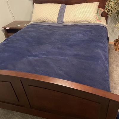 Queen mattress with frame and bedding
