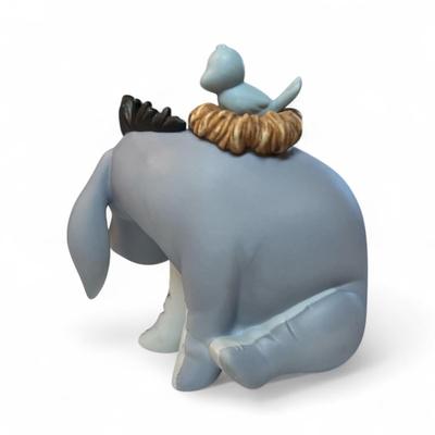 Sale Photo Thumbnail #684: Walt Disney Eeyore and small blue bird Pooh and Friends Figurine
Approximately 4"X3.5"