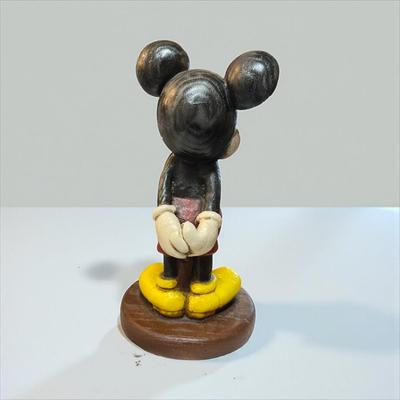 Sale Photo Thumbnail #692: Walt Disney Mickey Mouse Simulated Wood Figurine
Approximately 10" tall