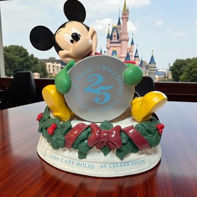 Sale Photo Thumbnail #695: Walt Disney 1996 Cast Member Holiday Celebration Mikey Mouse Figurine
Approximately 5"X5"