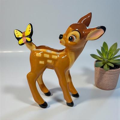 Sale Photo Thumbnail #703: Walt Disney Bambi with a Yellow Butterfly on Its tail Porcelain Figurine
Approximately 5" tall