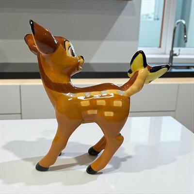 Sale Photo Thumbnail #702: Walt Disney Bambi with a Yellow Butterfly on Its tail Porcelain Figurine
Approximately 5" tall