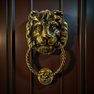 Sale Photo Thumbnail #717: Brass Lion Head Door Knocker and Strike Plate
Approximately 8" tall