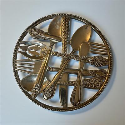 Sale Photo Thumbnail #729: Metal Wall Hanging/Trivet of Spoons, Knives and Forks
Approximately 9" across