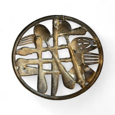 Sale Photo Thumbnail #728: Metal Wall Hanging/Trivet of Spoons, Knives and Forks
Approximately 9" across